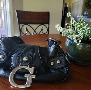 Guess small purse with small strap. Free black bel